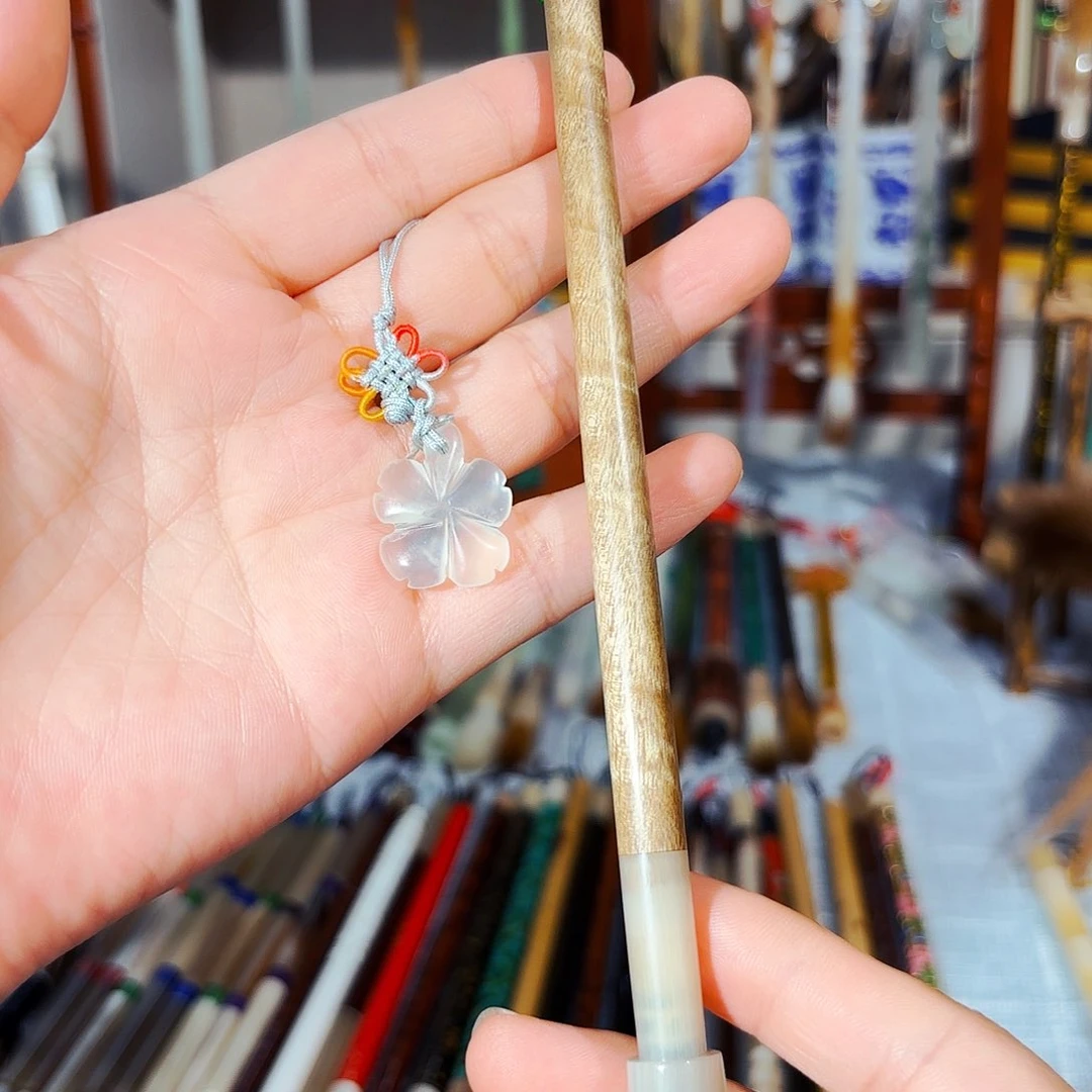 骏***_金丝楠木特级品种一花黑尖紫毫