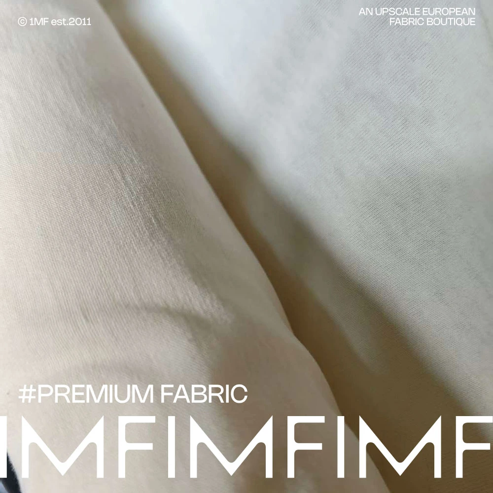 JIS 奶油杏色纯色 棉+微量VI  肌理感针织T恤布料面料 幅宽145CM