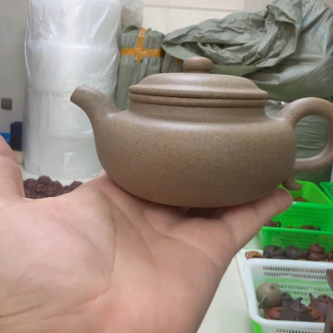 茶杯紫砂微瑕的壶