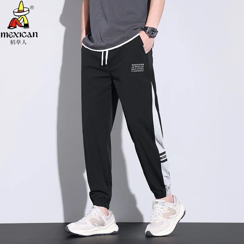 Mexican/稻草人夏季冰丝薄款休闲裤男韩版潮流透气弹力百搭休闲裤