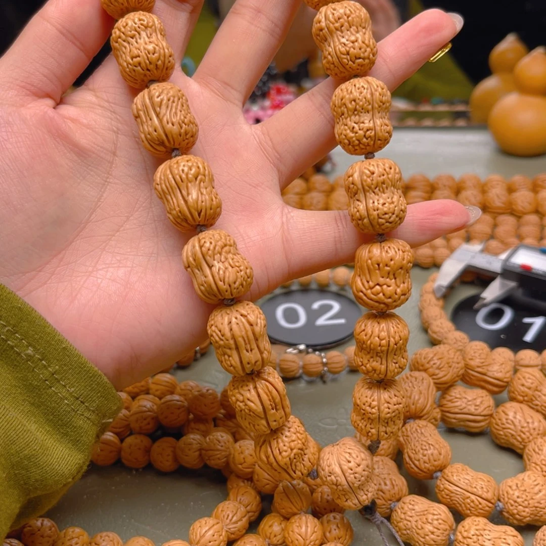 梧****桃核吊坠桃核手持