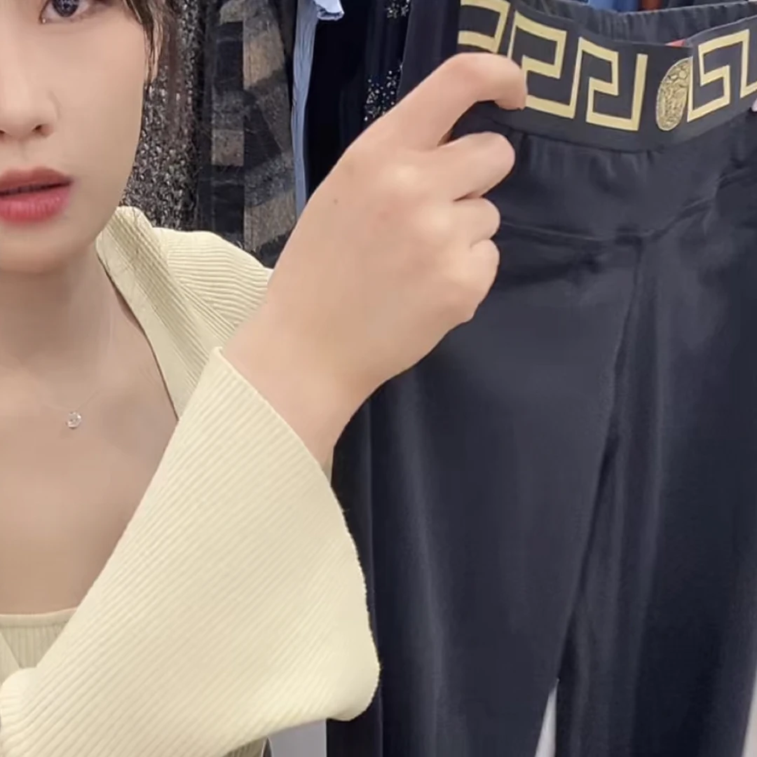 99新 Alexander McQueen/亚历山大·麦昆 范思哲裤子时尚休闲