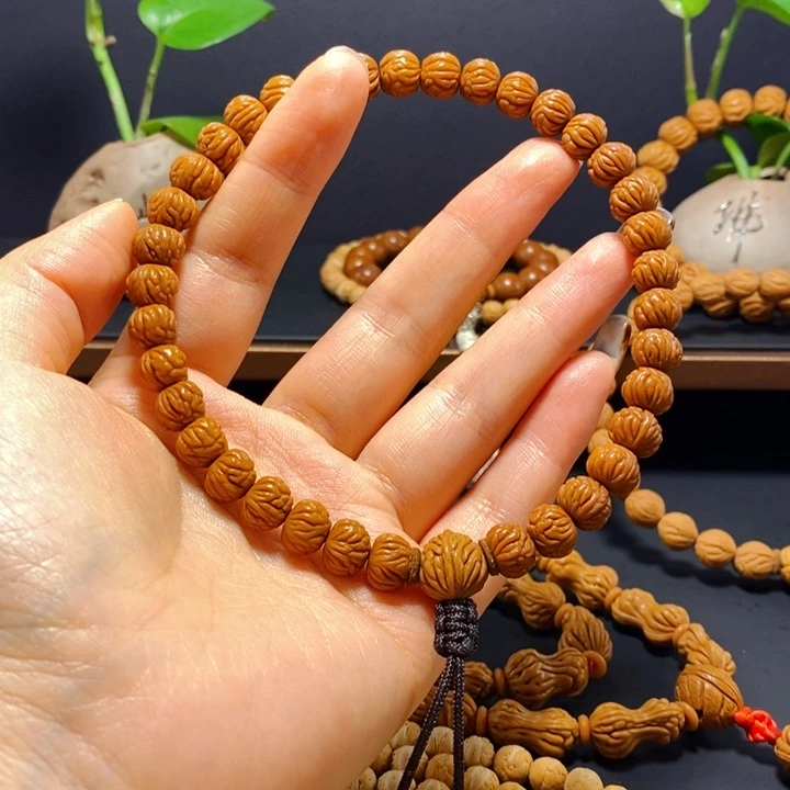 无***羁手串桃核野生凤羽手持