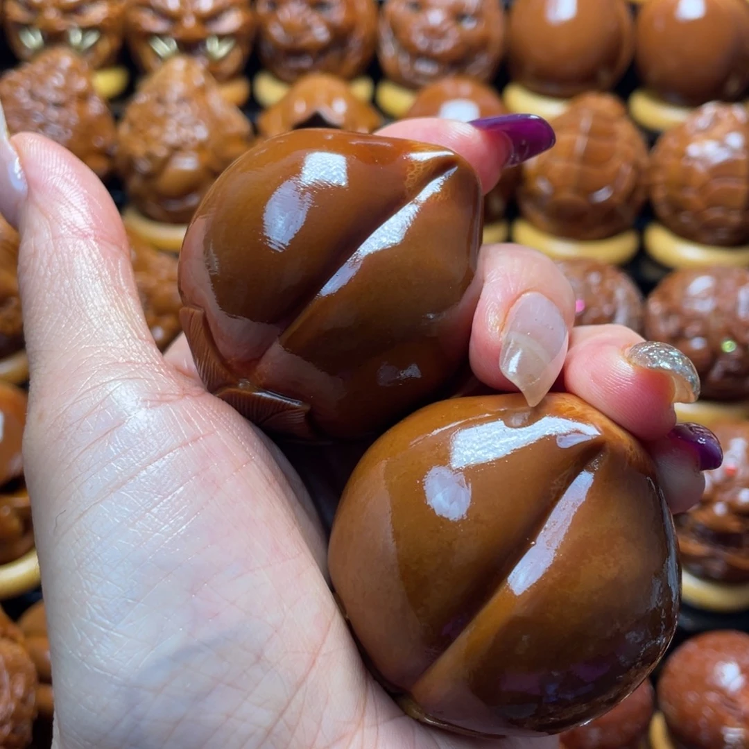 狼***把件橄榄核橄榄球