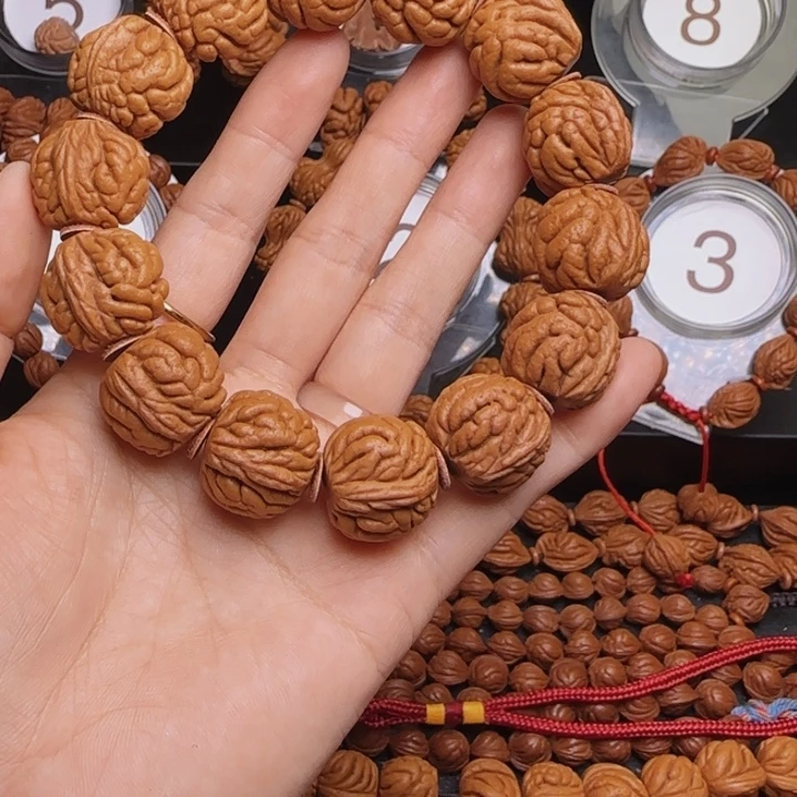 用***9桃核手串龙纹桃核
