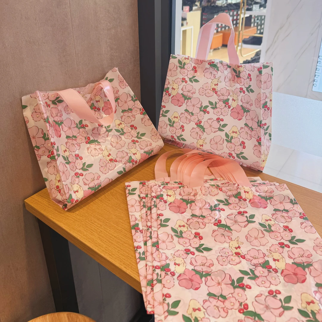 粉色花间小兔手提袋加厚塑料袋小清新礼品袋童装店购物袋
