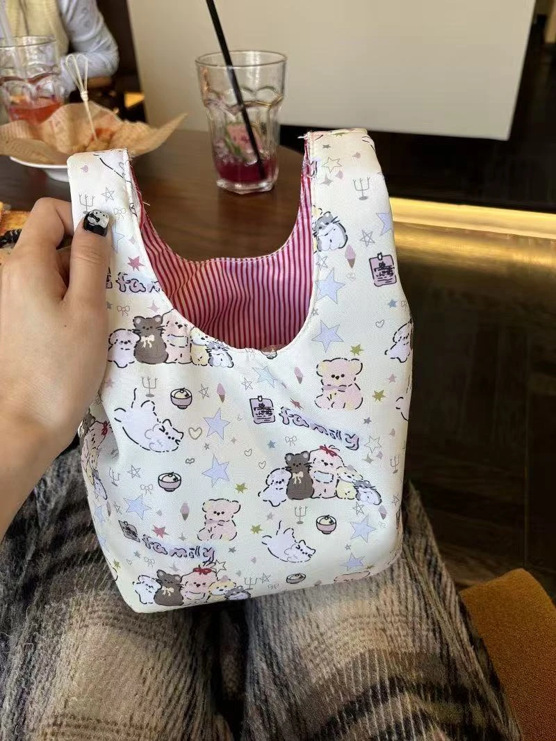 少女小狗手腕包高颜值通勤新款外出可爱拎包便携遛弯小包包精致