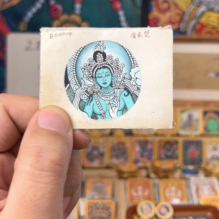 吊坠是***?有点梵唐卡  绿妈妈