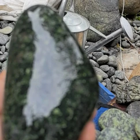 玉用****0藏玉药王石原石大手把件一个