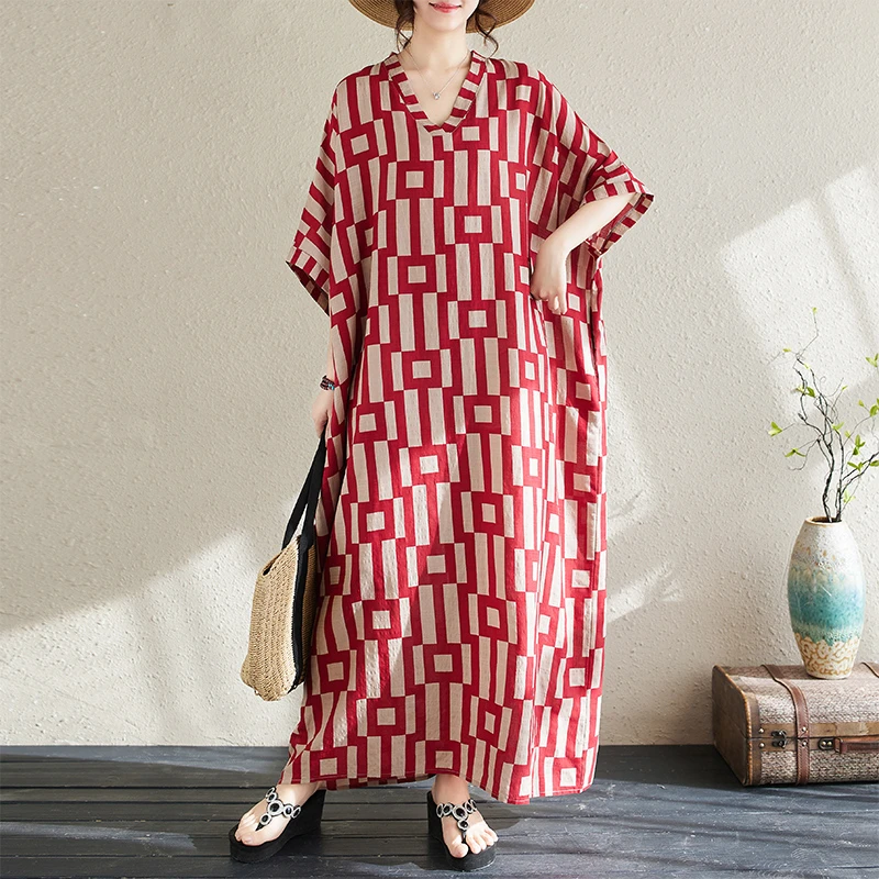 2025夏季款女V领复古长裙遮肉棉麻显瘦气质花色度假风旅游连衣裙