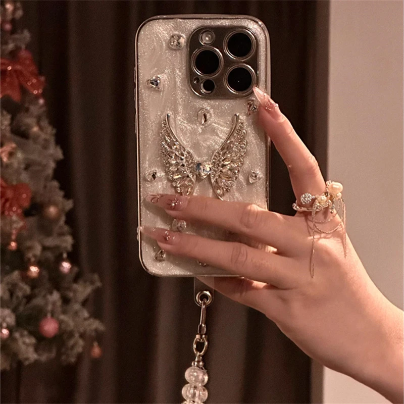 滴胶立体闪钻天使翅膀适用苹果16手机壳iPhone15新14全包13防摔女