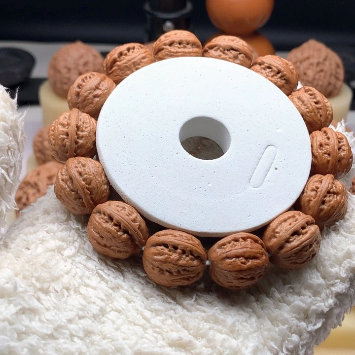 忧***水文玩核桃把件秋子串