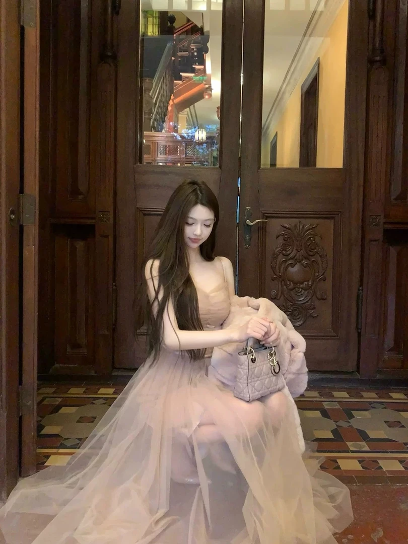 网纱拼接蝴蝶结吊带连衣裙女夏季度假风修身长裙气质收腰蓬蓬裙子