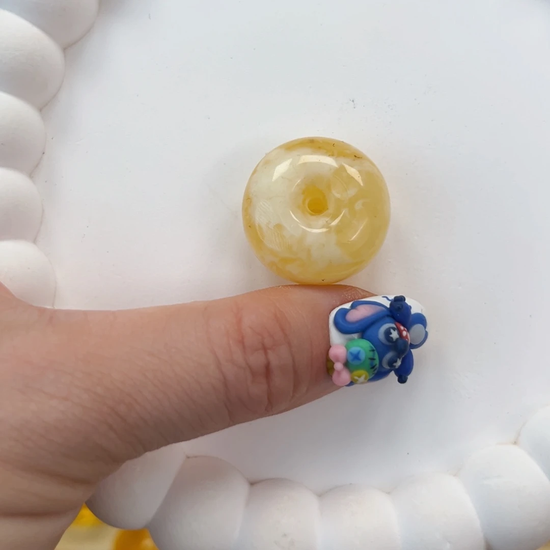 裸石琥珀未镶嵌扣子微粉