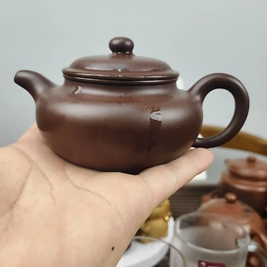 茶壶紫砂摸着也约有