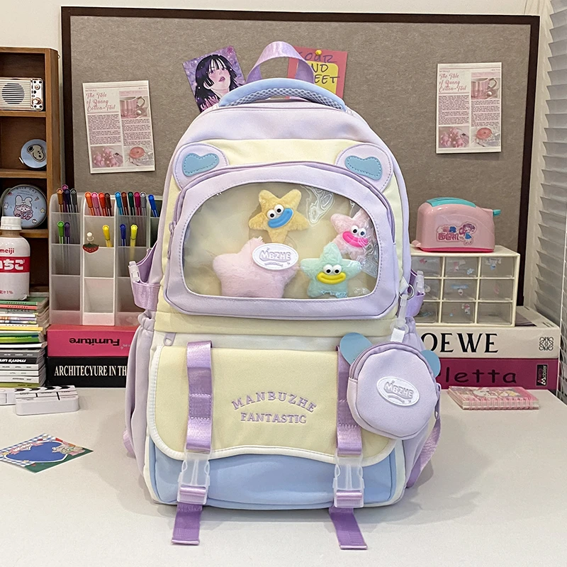 梓文高颜值可爱痛包小学生大容量双肩包减负书包初中超轻春游背包