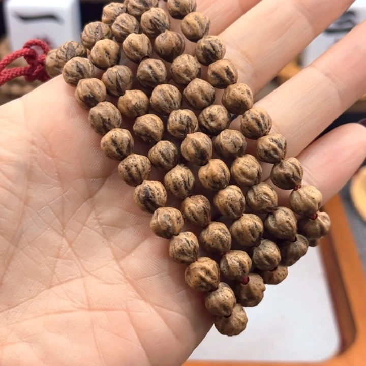 兆***金吊坠柏香籽/百香籽原桩脏串