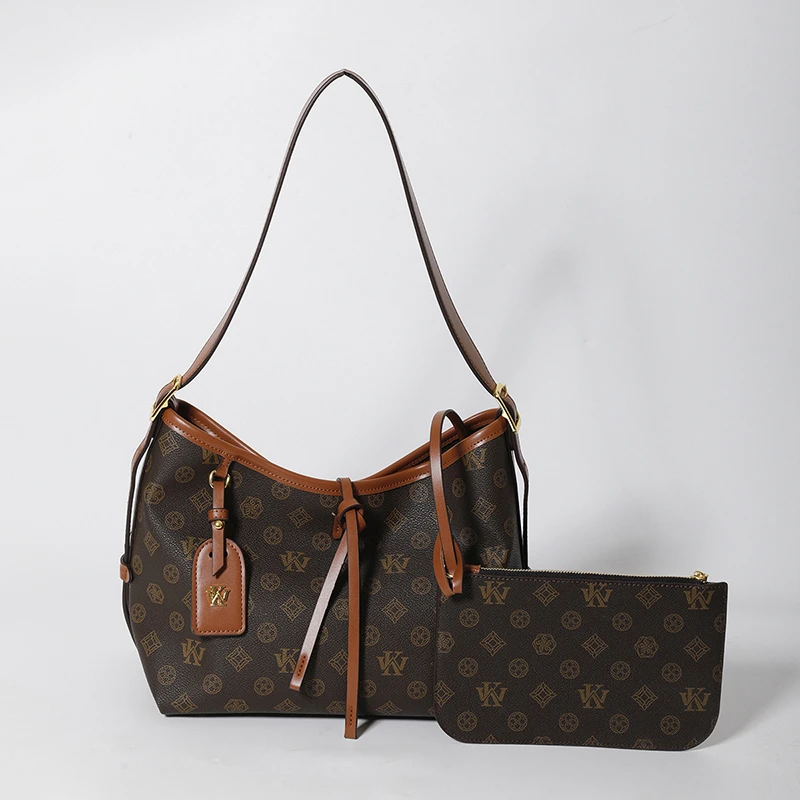 香港真皮质感托特包女2025新款春夏高级感大容量通勤单肩腋下大包