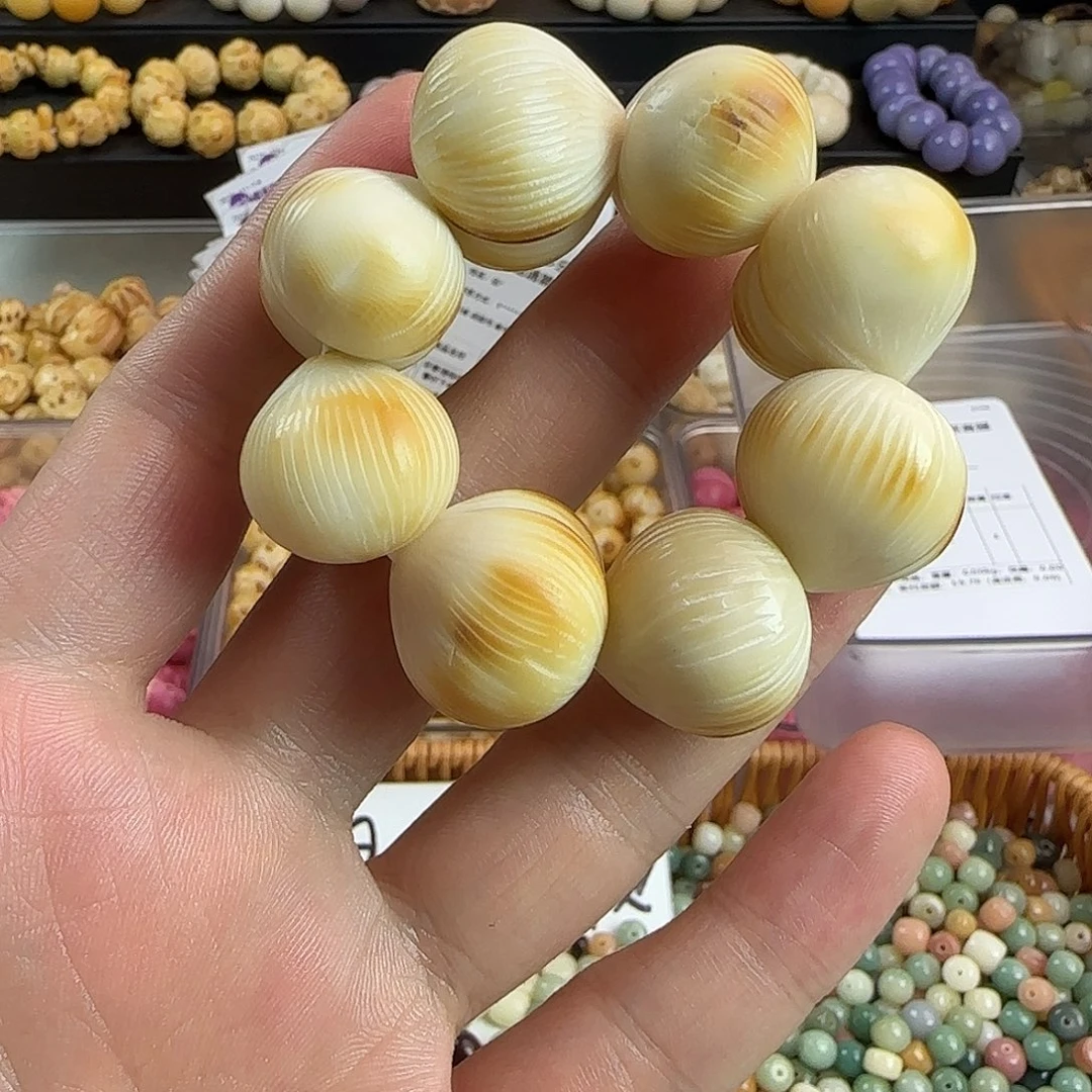 菩提根/象牙果手串微瑕疵炭烤拉丝屁桃手捻1个