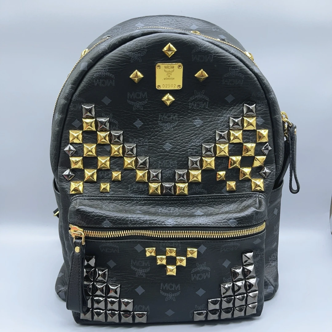95新 MCM  黑色铆钉双肩包  1666 9633