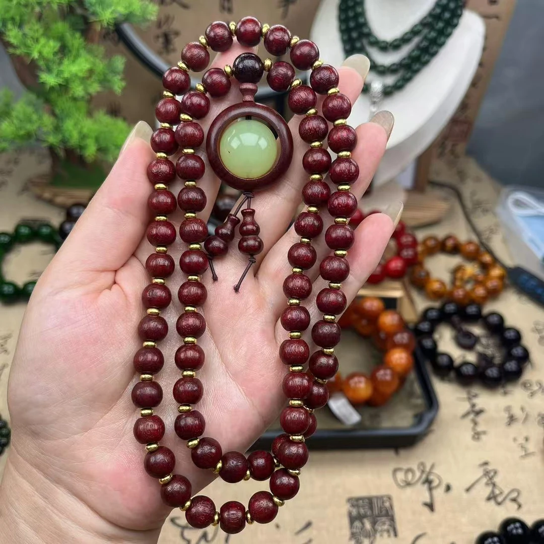 64颗红料脖挂+夜光石【1457】