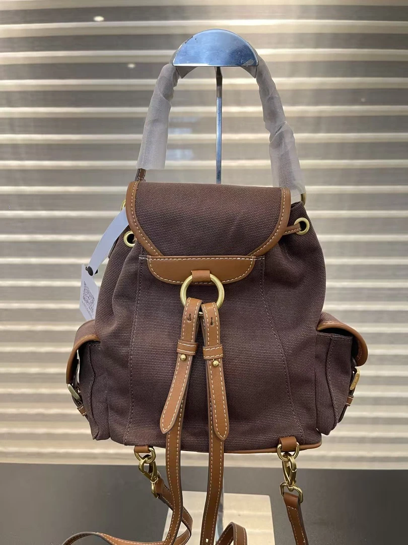 妹妹帆布咖色双肩包