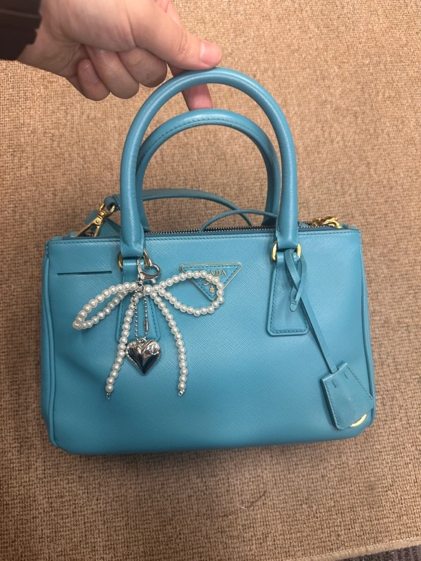 95新 Prada/普拉达 新湖蓝色小号手提斜挎包