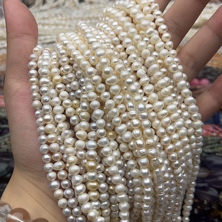 玛瑙/玉髓未镶嵌珠宝半成品一条5.5mm左右椭圆珍珠有生长纹