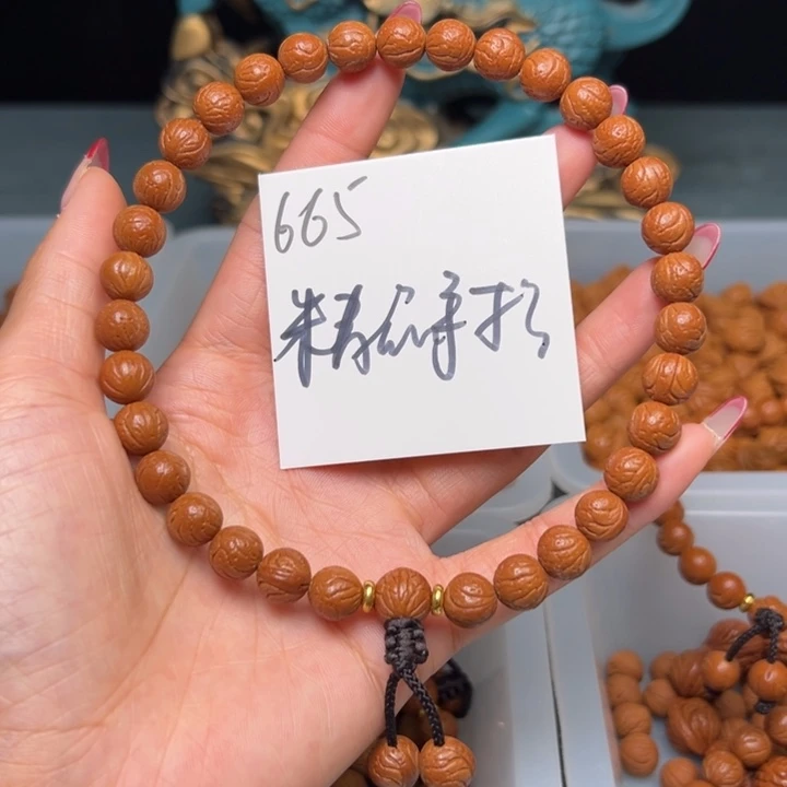 桃核把件秦岭野生龙纹桃核玉龙脊