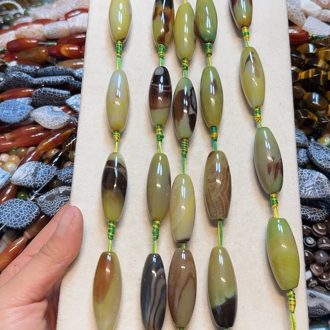 玛瑙/玉髓合金珠宝半成品黄绿玛瑙孔雀天珠一条