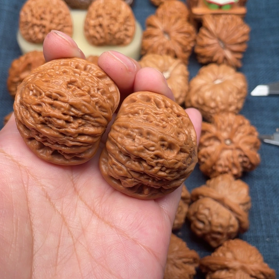 诬***结文玩核桃把件40铁锤全品