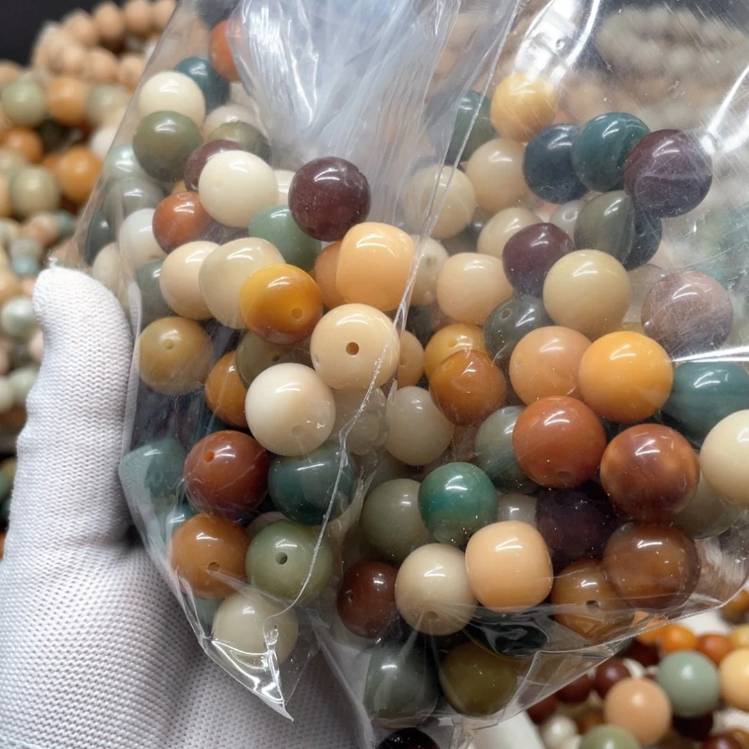 菩提根/象牙果吊坠瑕疵水磨混珠100颗9999