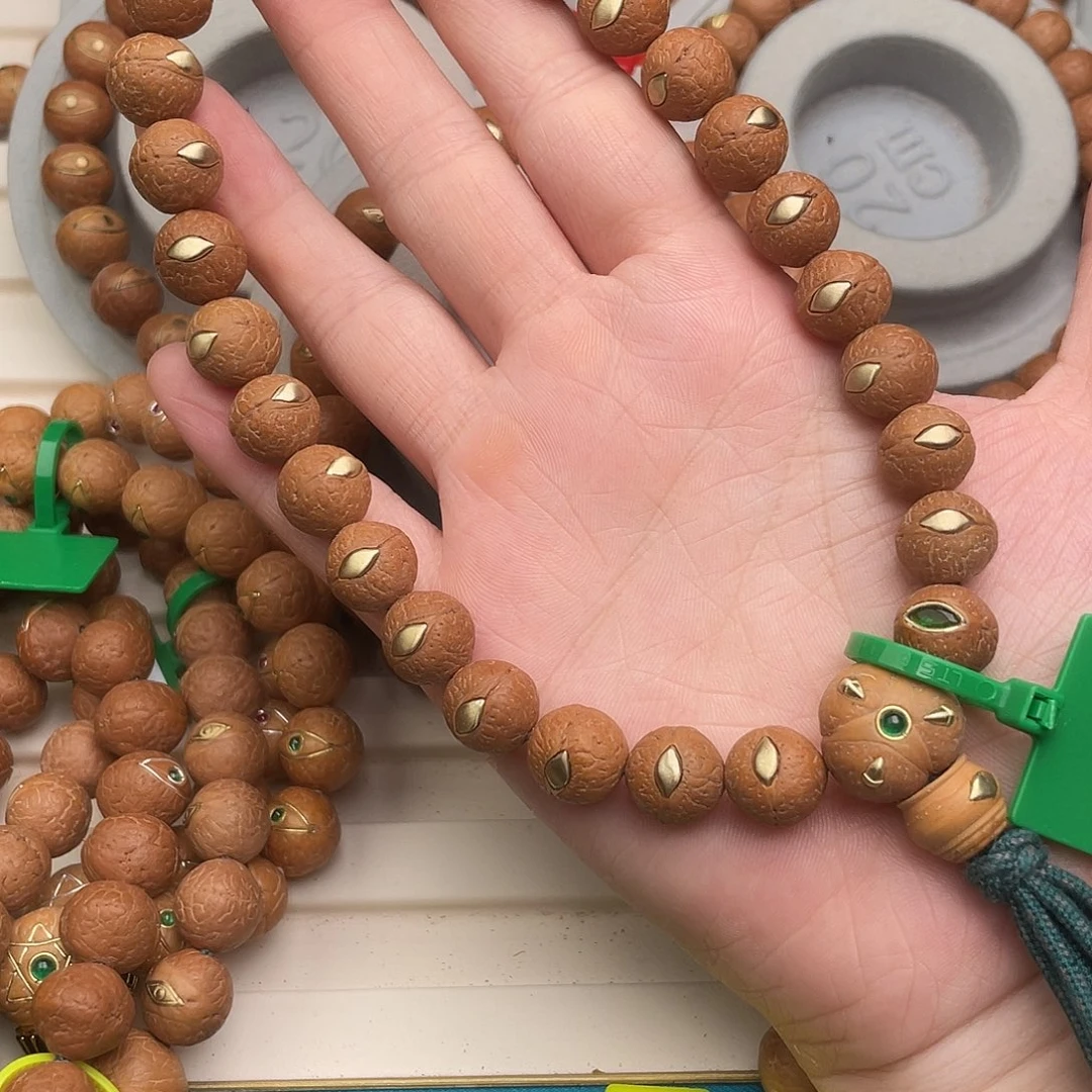 凤眼菩提吊坠紫金