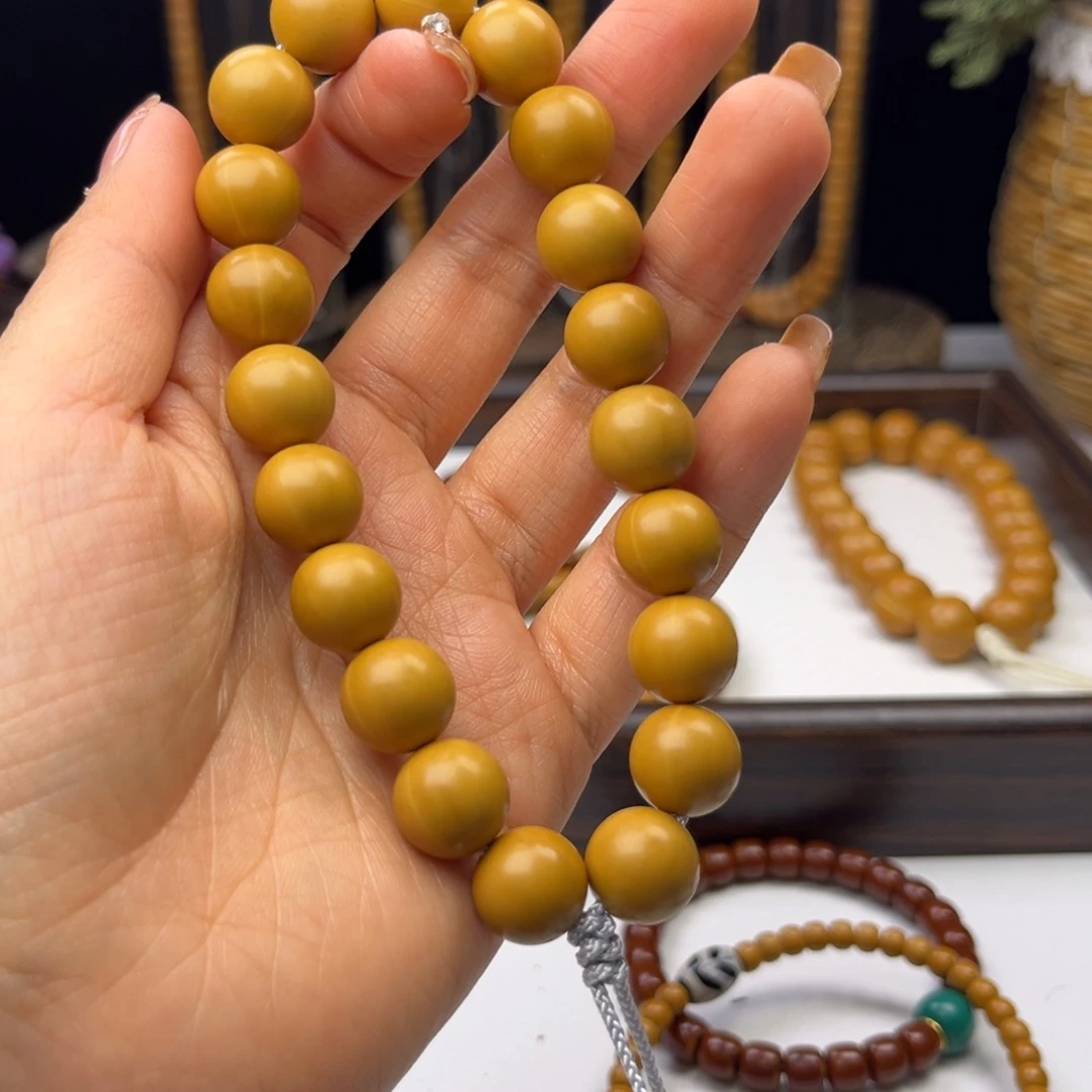 橄榄核吊坠猴头手持