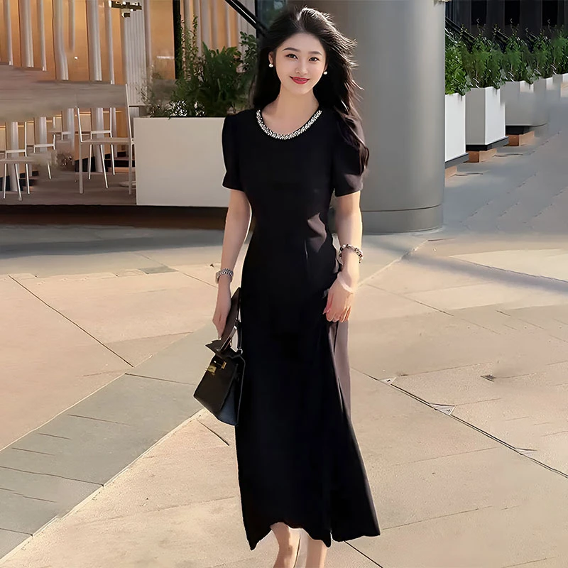 法式赫本风黑色钉珠短袖连衣裙女2025夏季新款收腰显瘦A字长裙子