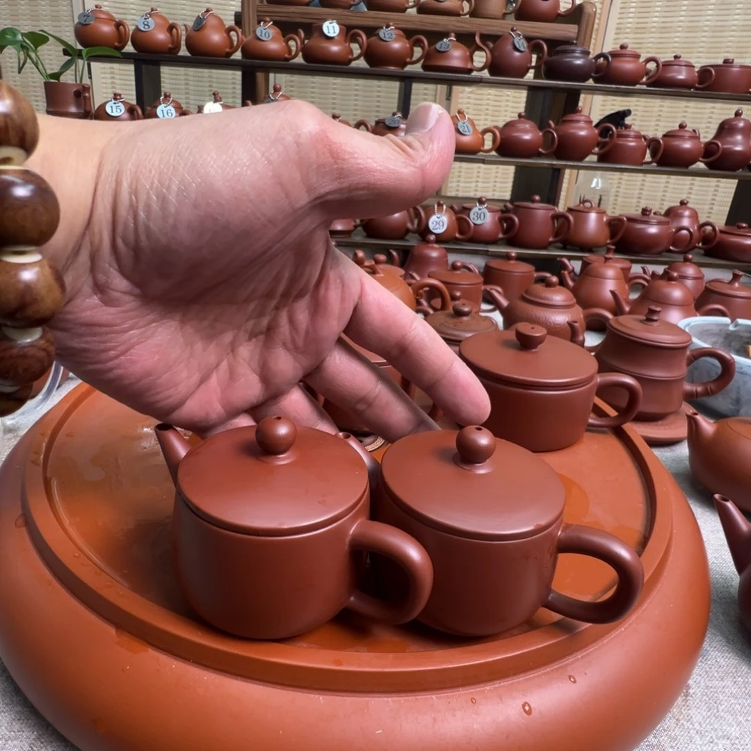 紫砂茶壶C****?潮州手拉朱泥壶2把，微瑕不退换