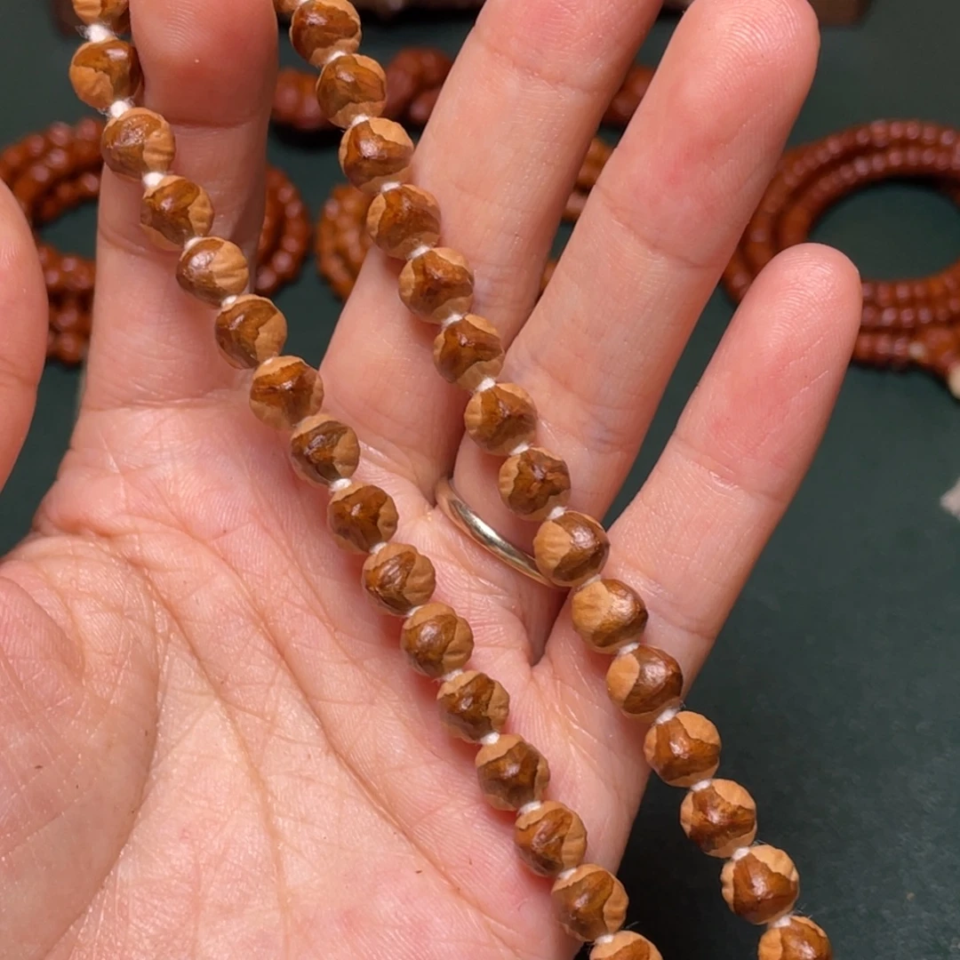 柏香籽/百香籽吊坠三棱手持