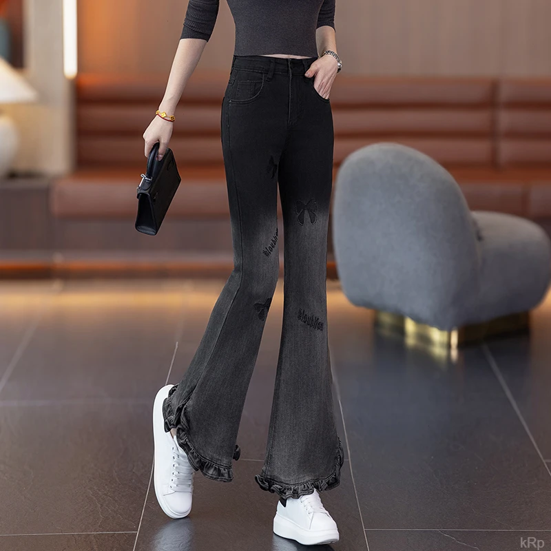 春秋2025新款复古气质荷叶边气质微喇牛仔裤女蝴蝶刺绣修身冬长裤