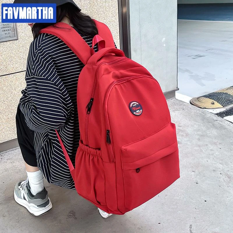 双肩包女2025新款大容量高中生红色大学生书包旅行轻便女生背包男