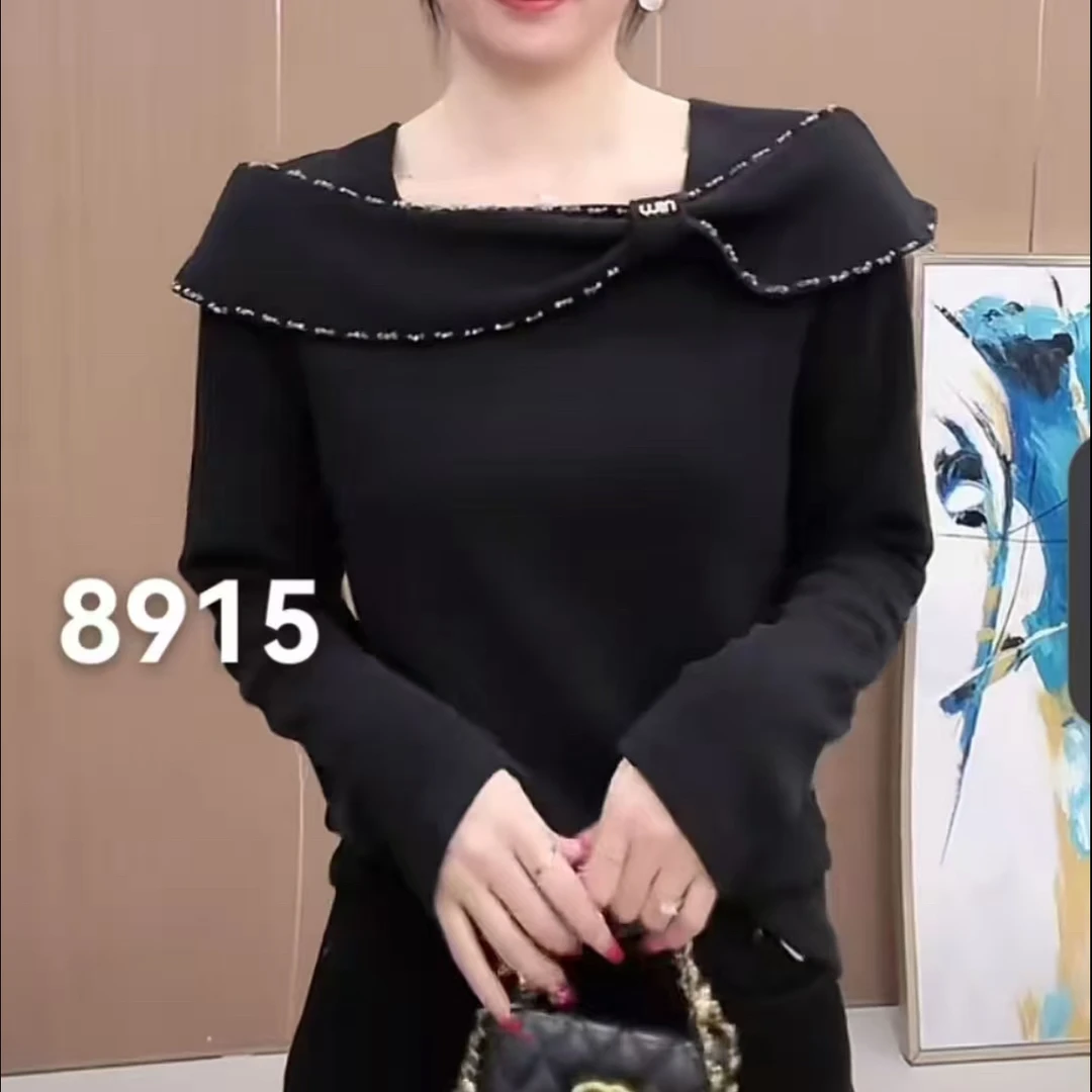 早春新款荷叶边时装上衣8915