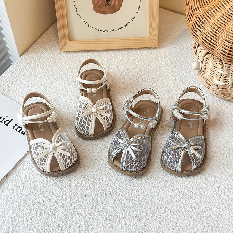 女童蝴蝶结凉鞋2025夏季新款儿童软底公主鞋镂空包头编织沙滩鞋18