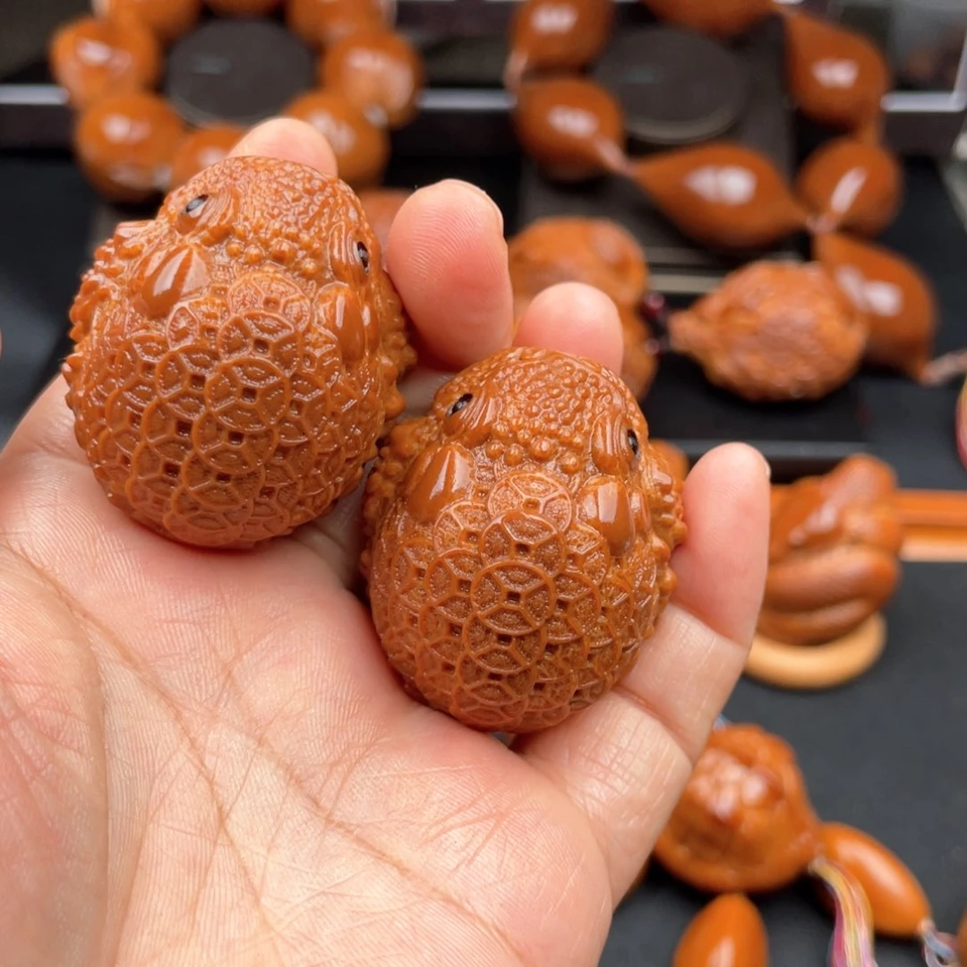 把件橄榄核金币金蟾一对