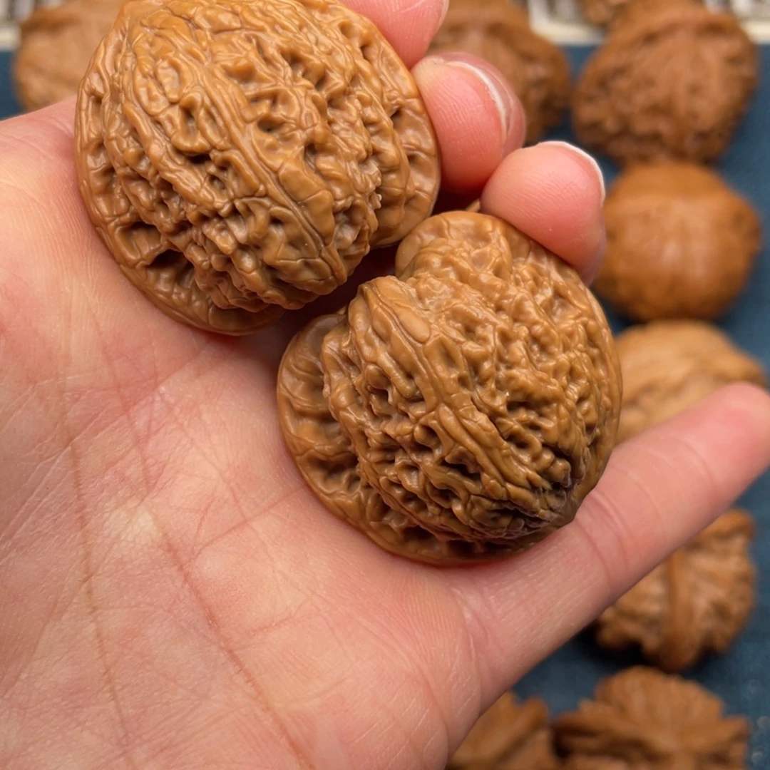 文玩核桃把件34全品红宝石狮子头手捻