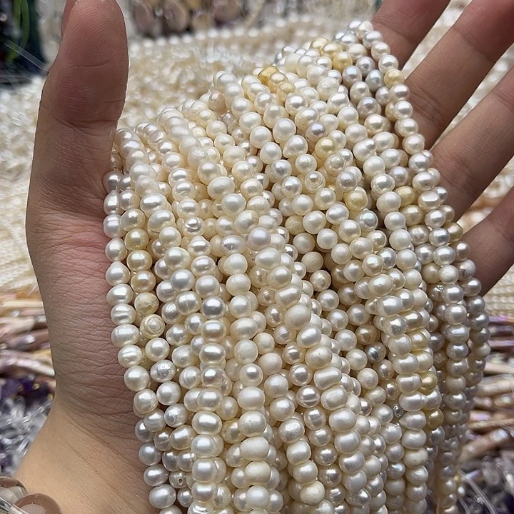 玛瑙/玉髓未镶嵌珠宝半成品一条5.5mm左右椭圆珍珠有生长纹