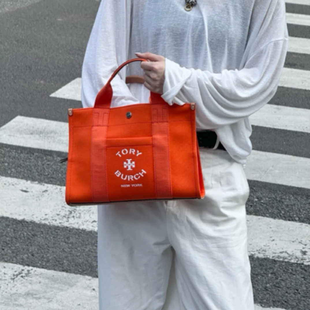 99新 TORY BURCH/汤丽柏琦 TB99新橙色帆布手拎斜挎包