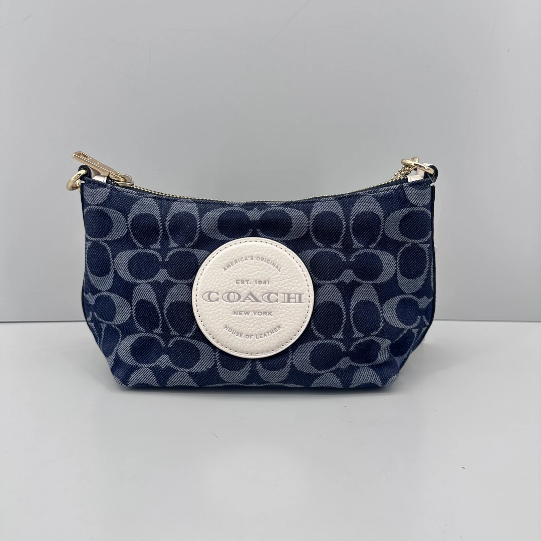 95新 COACH/蔻驰 dempsey蓝色香布蕾老花帆布腋下17x13x9M011805