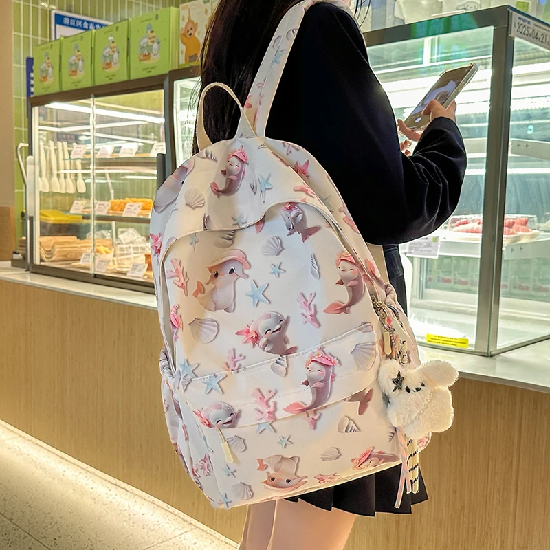 卡通可爱印花书包女初中生休闲轻便高颜值背包高中生大容量双肩包