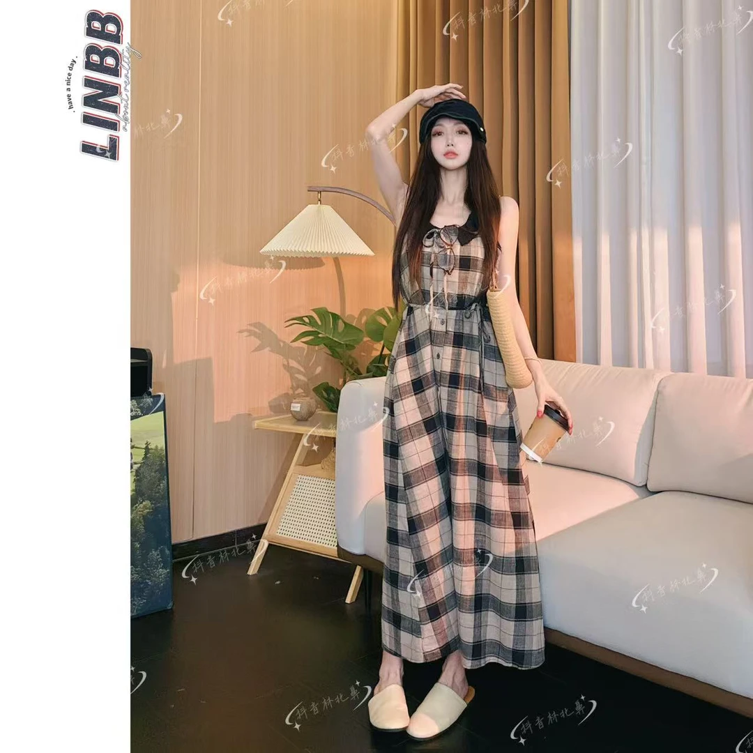 林北鼻-【阿芙佳朵】韩单夏日棉麻格子显白气质连衣裙