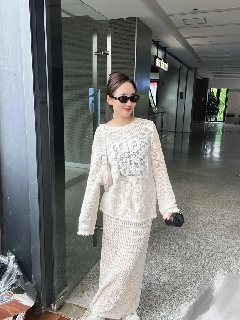 时尚镂空提花宽松长袖衫女毛衣HG3326
