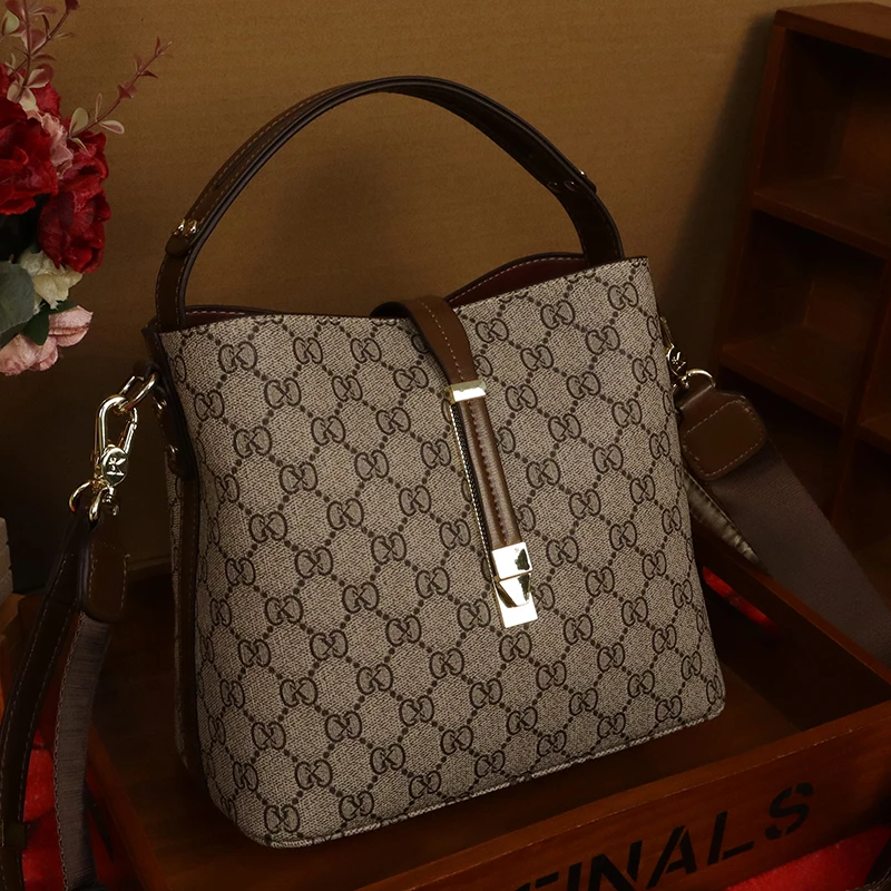 秋冬双根水桶包女士包简约经典潮流单肩耐脏磁扣单肩包轻奢时尚包